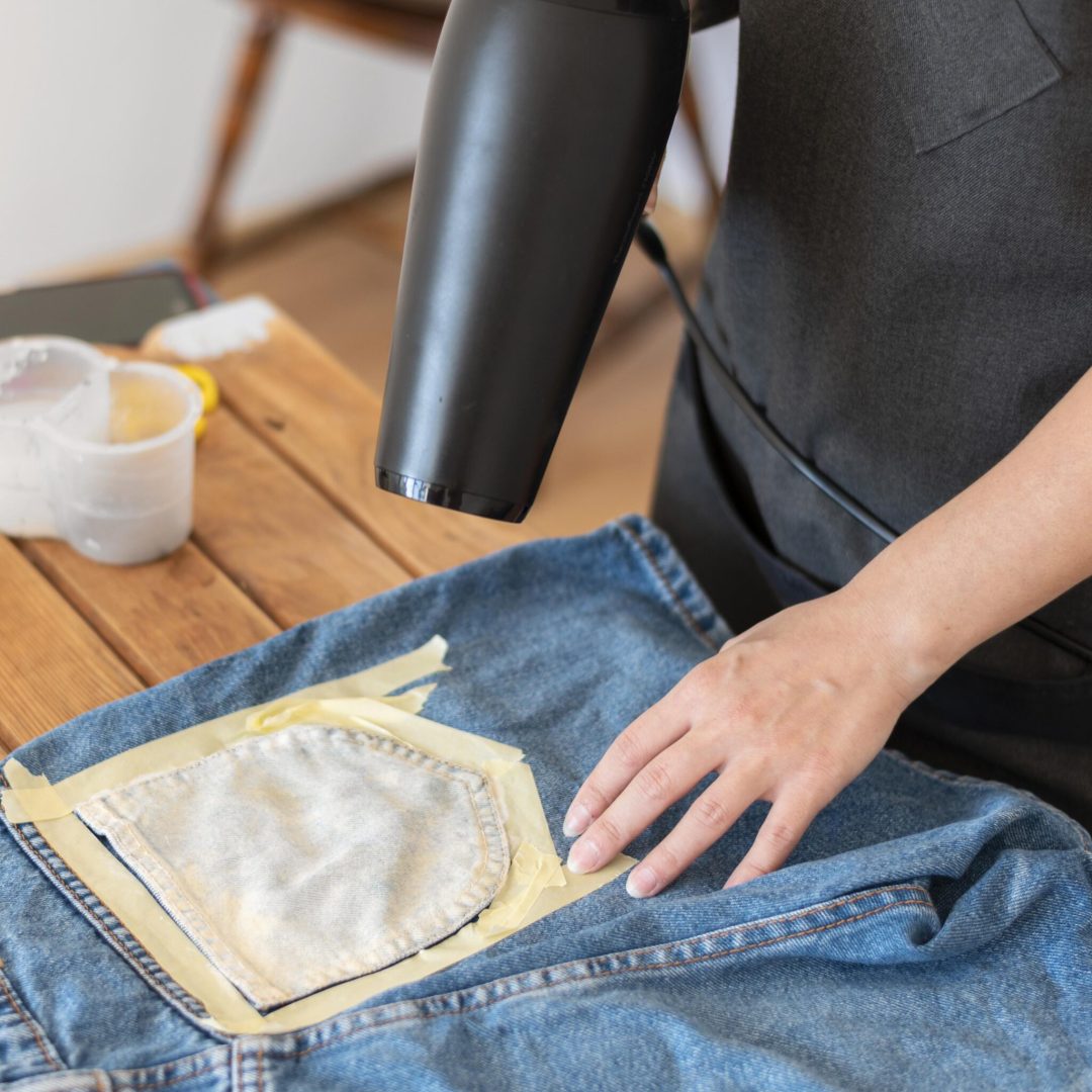 close-up-hands-blow-drying-shorts